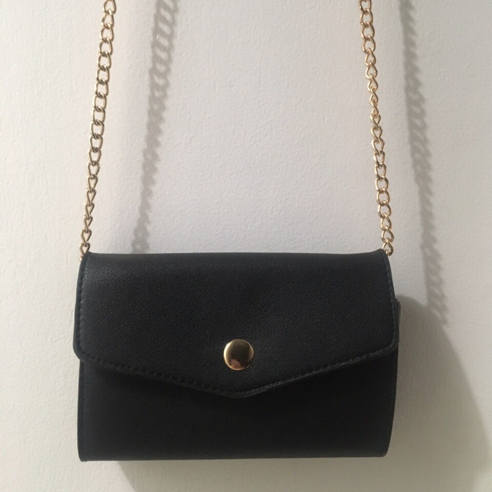 black cross body bag with gold chain